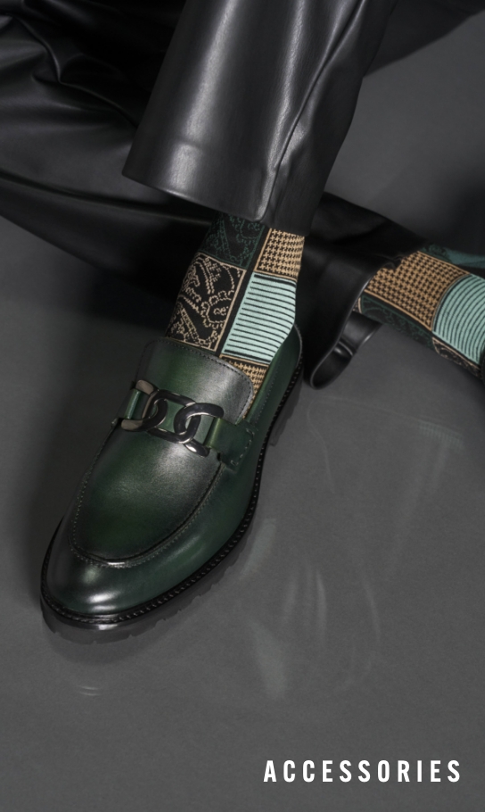 Men's Accessories view all category. Image features the Hale and Checkered Paisley sock in green.