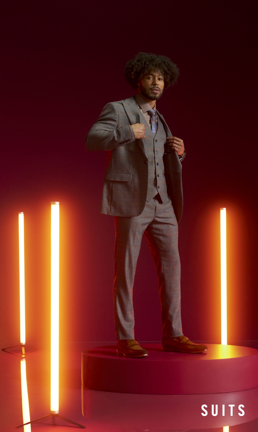 Men's Suits category. Image features a grey plaid Stacy Adams suit.