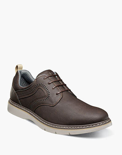 Stride Plain Toe Lace Up in Brown.                        
